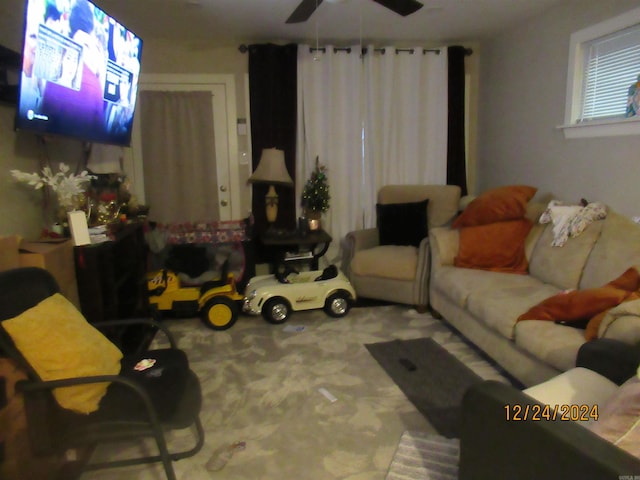 living room featuring ceiling fan