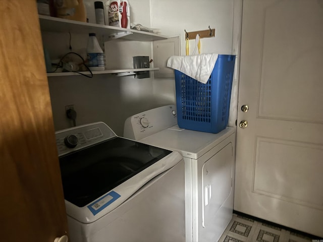 laundry area featuring washer and clothes dryer