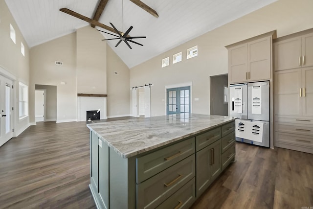 kitchen featuring a center island, dark wood-type flooring, high vaulted ceiling, french doors, and beamed ceiling