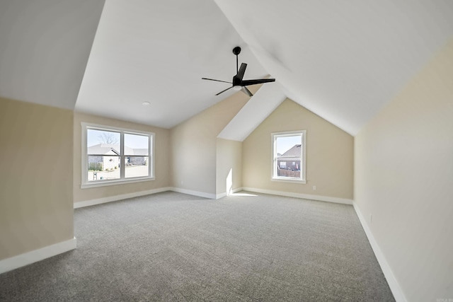 bonus room featuring carpet flooring, ceiling fan, plenty of natural light, and lofted ceiling