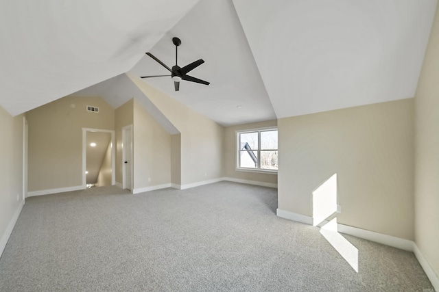 bonus room with ceiling fan, light colored carpet, and lofted ceiling