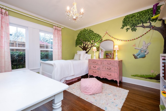 bedroom featuring dark hardwood / wood-style flooring, a chandelier, and ornamental molding