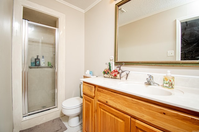 bathroom with ornamental molding, vanity, a textured ceiling, tile patterned flooring, and toilet