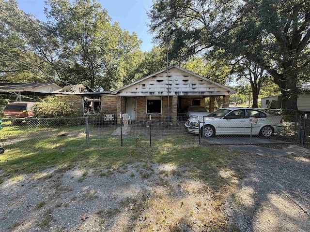 view of front of home with a carport