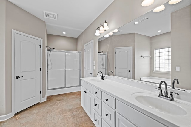 bathroom featuring vanity and plus walk in shower