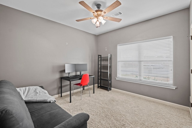 office featuring carpet and ceiling fan