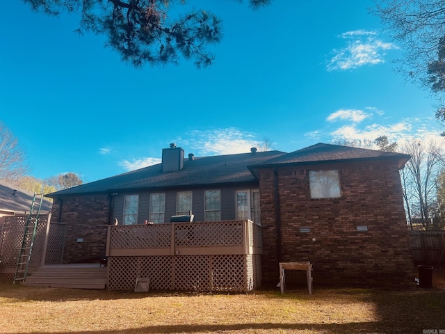 back of property featuring a deck