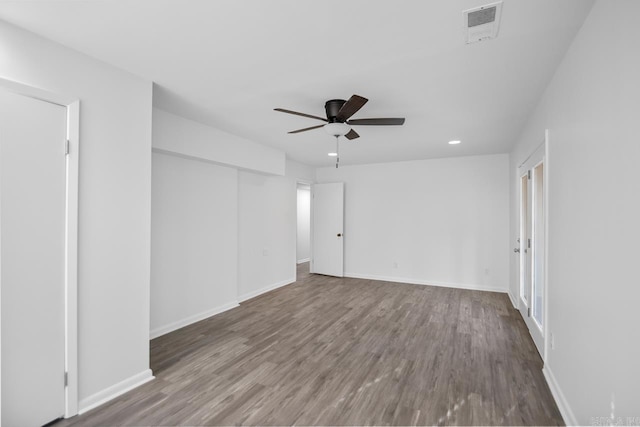 unfurnished room featuring ceiling fan and hardwood / wood-style flooring