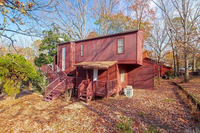 back of property with central AC unit