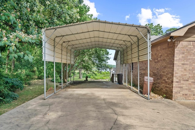 view of vehicle parking featuring a carport