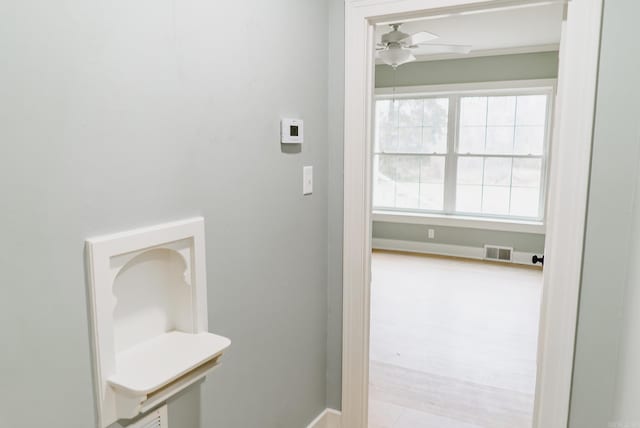 bathroom with ceiling fan