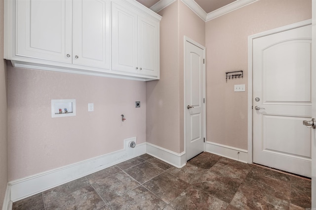 clothes washing area featuring crown molding, cabinets, gas dryer hookup, electric dryer hookup, and washer hookup