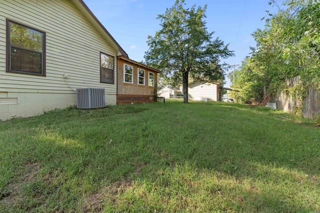 view of yard featuring central AC unit