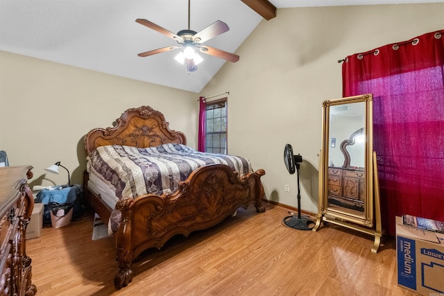 bedroom with vaulted ceiling with beams, light hardwood / wood-style flooring, and ceiling fan