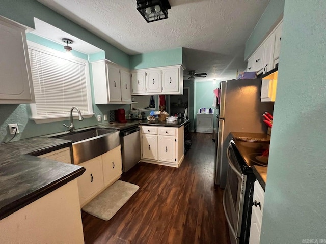 kitchen with a textured ceiling, ceiling fan, white cabinetry, and stainless steel appliances