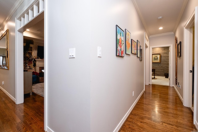 hallway featuring ornamental molding and dark wood-type flooring