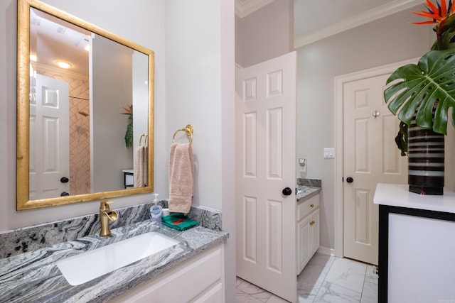 bathroom with vanity and ornamental molding