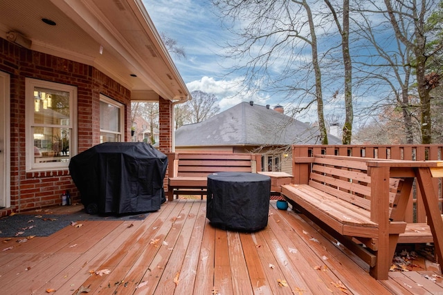 wooden terrace with area for grilling