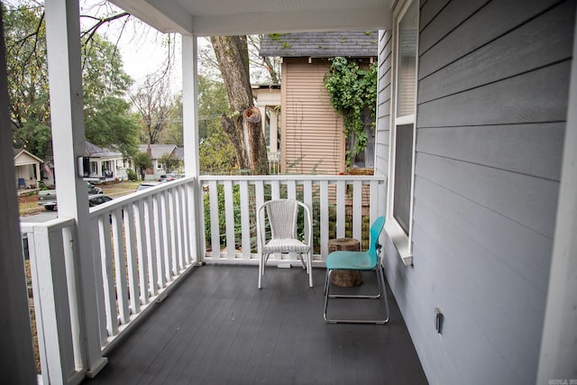 balcony featuring a porch