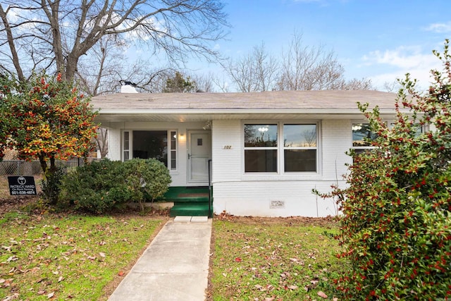 bungalow with a front yard