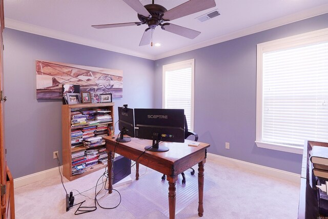 carpeted office space with ceiling fan and ornamental molding