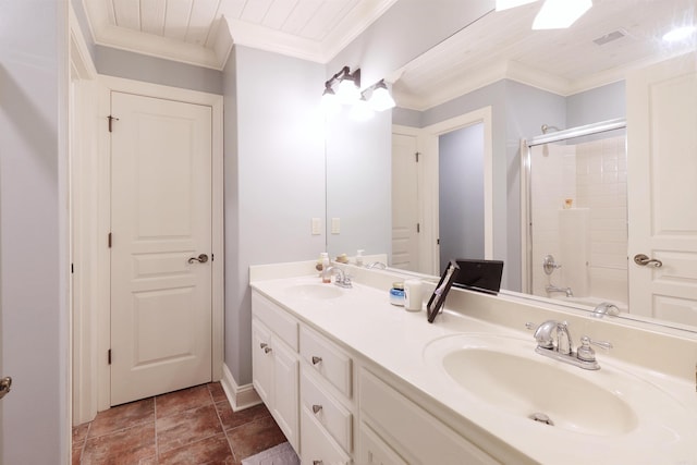 bathroom featuring crown molding, vanity, and combined bath / shower with glass door