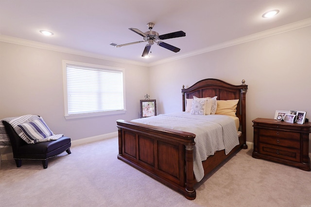 carpeted bedroom featuring ceiling fan and ornamental molding