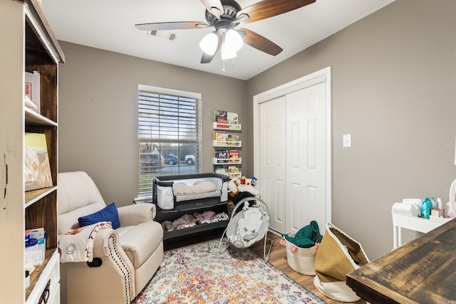 interior space with light hardwood / wood-style floors and ceiling fan