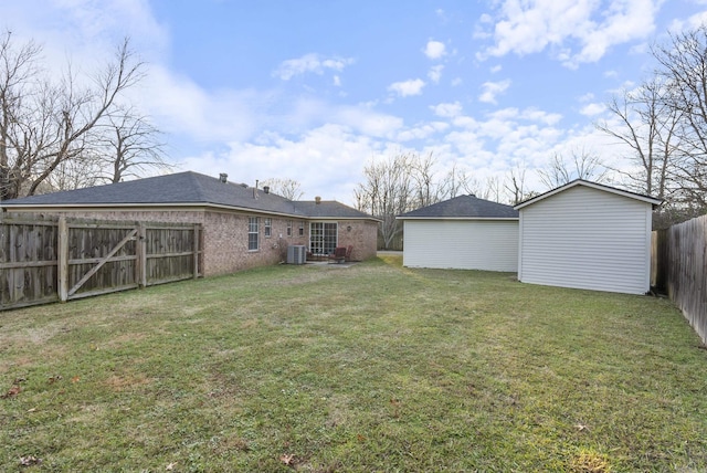 view of yard with central AC