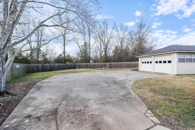 view of yard featuring a garage