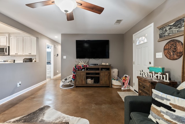 living room with ceiling fan