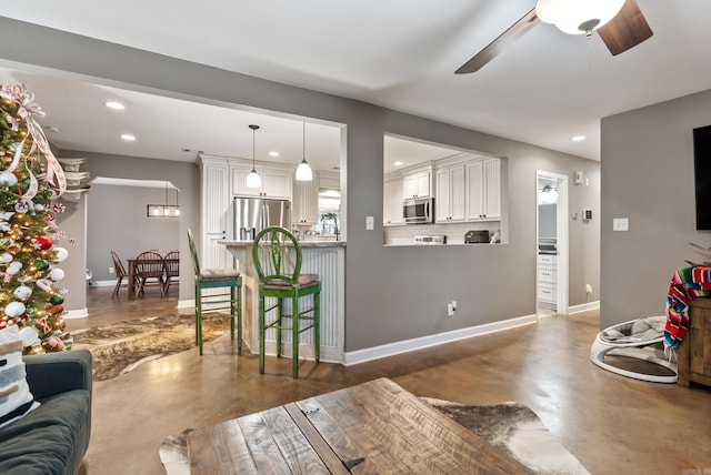 living room with ceiling fan