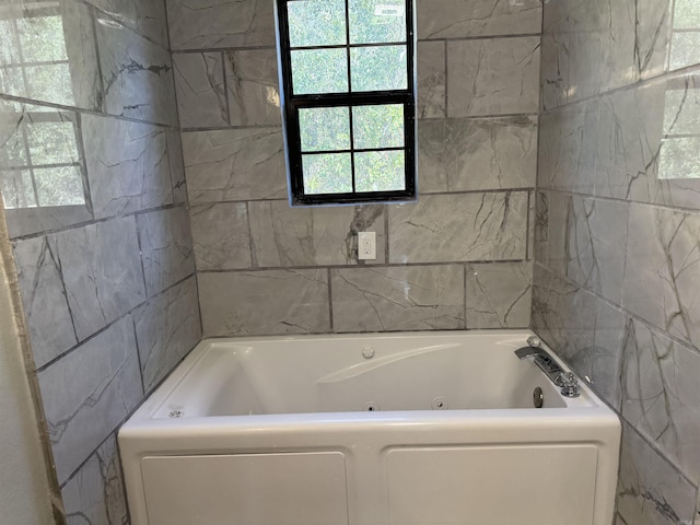 bathroom featuring a tub