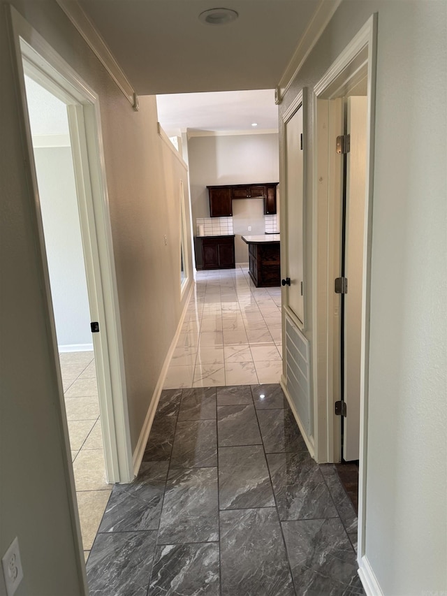 hallway with ornamental molding