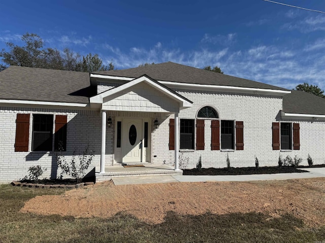 view of front of home with a front yard