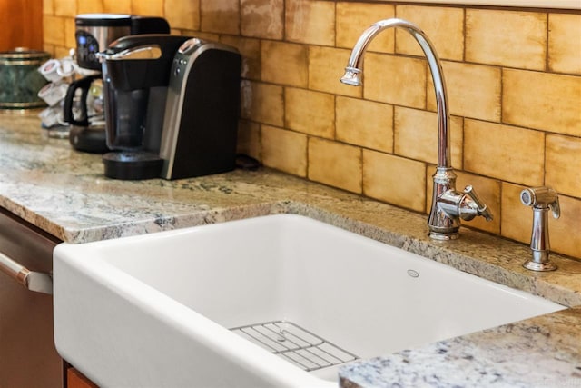 interior details with light stone counters and sink