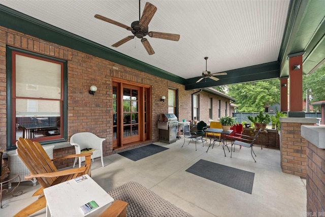 view of patio featuring ceiling fan and area for grilling