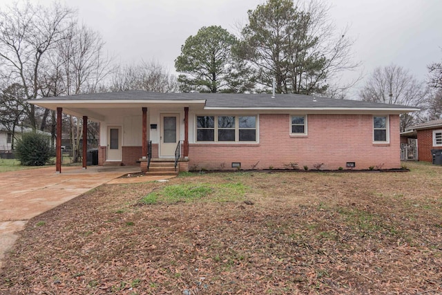 view of front of property with a carport