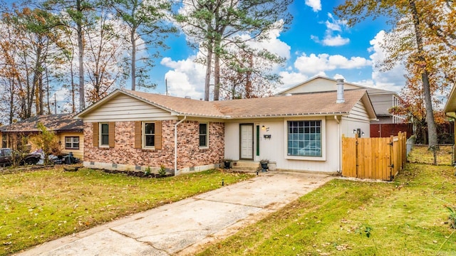 ranch-style house with a front yard