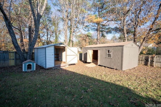 view of outbuilding with a lawn