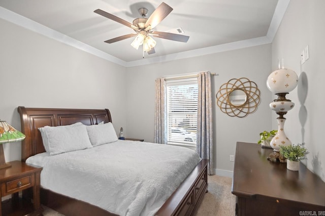 bedroom with light carpet, ceiling fan, and crown molding