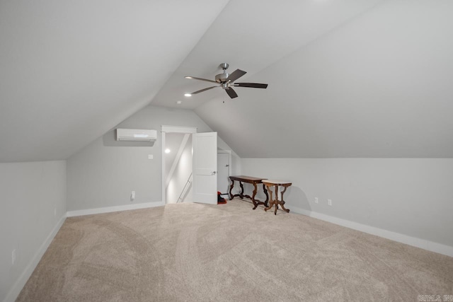 bonus room with an AC wall unit, ceiling fan, carpet, and vaulted ceiling