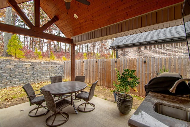view of patio / terrace with grilling area, ceiling fan, and sink