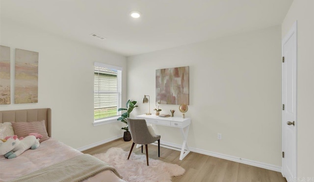 bedroom featuring light hardwood / wood-style floors