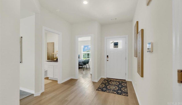 entrance foyer featuring light wood-type flooring