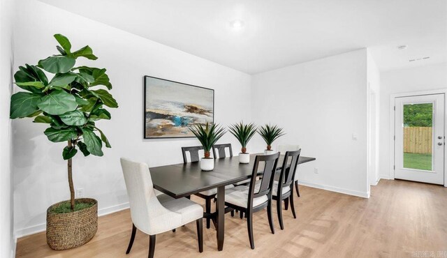 dining room featuring light wood-type flooring