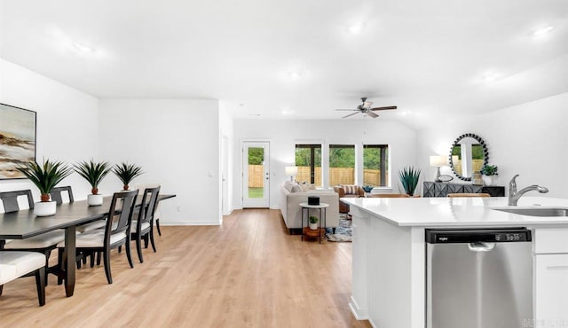 kitchen with white cabinetry, dishwasher, ceiling fan, sink, and light hardwood / wood-style floors