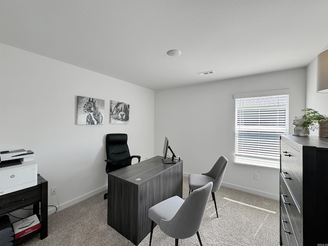 view of carpeted office space