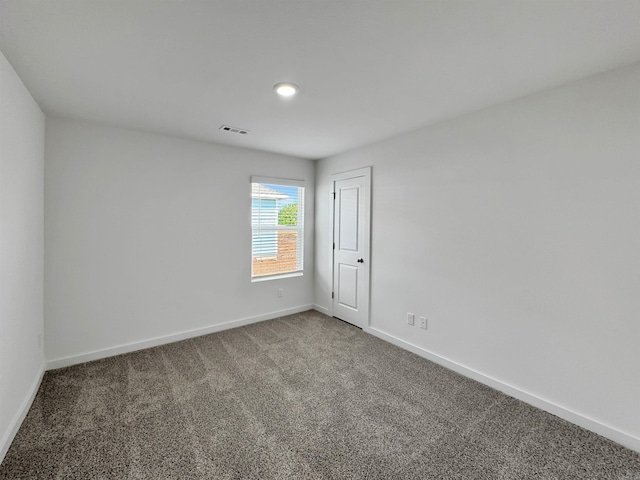 view of carpeted spare room