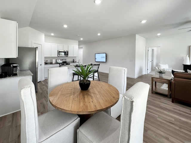 dining area featuring light hardwood / wood-style floors